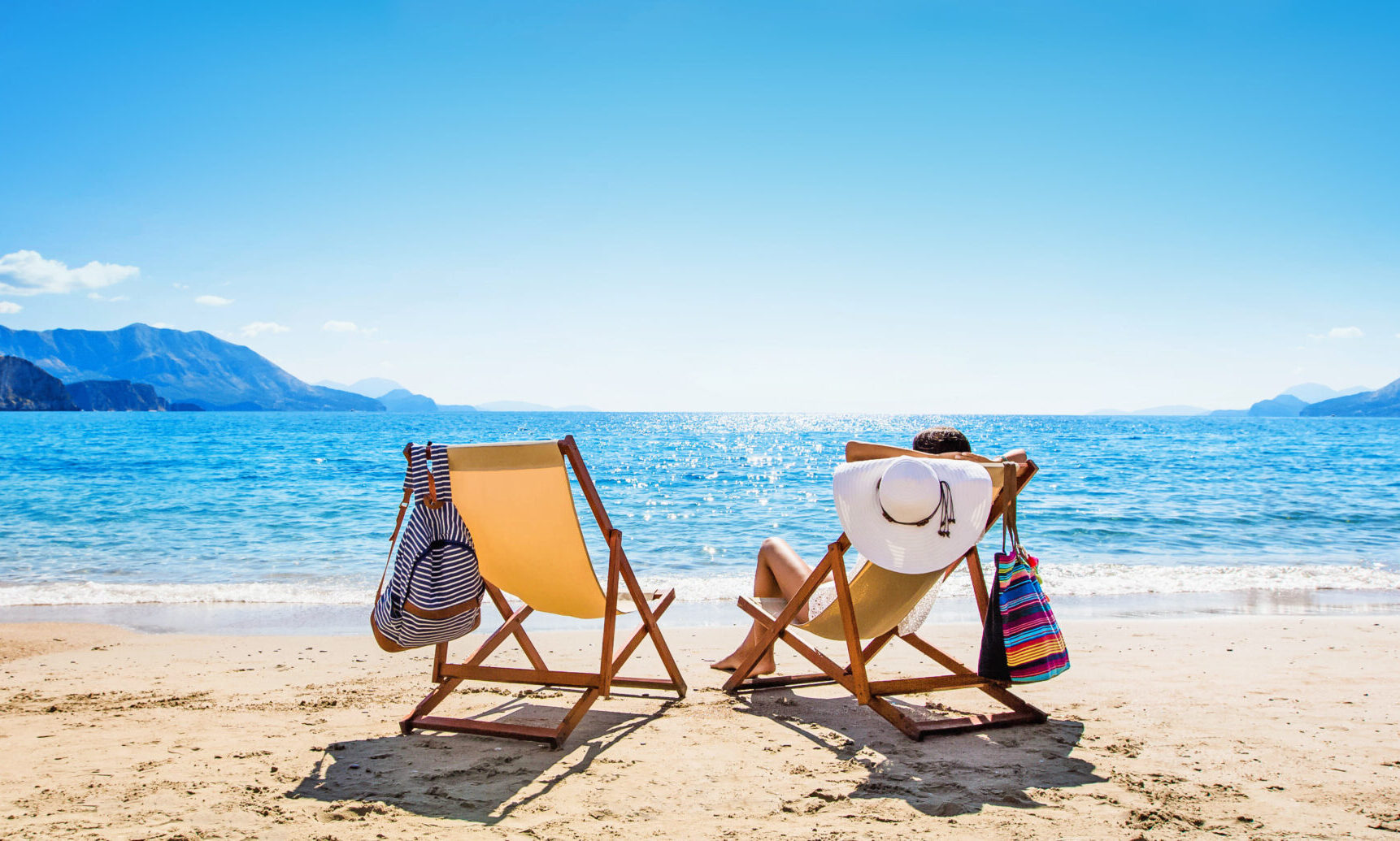 Woman enjoying sunbathing at beach